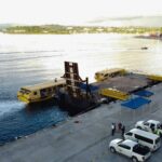 Tropical Agency Ltd and Knightsbridge Investments put together a barge-mounted access ladder and walkway to support Royal Caribbean Lines (RCL) cruise ship calls of Ovation of the Seas.