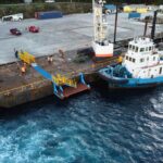 Tropical Agency Ltd and Knightsbridge Investments put together a barge-mounted access ladder and walkway to support Royal Caribbean Lines (RCL) cruise ship calls of Ovation of the Seas.