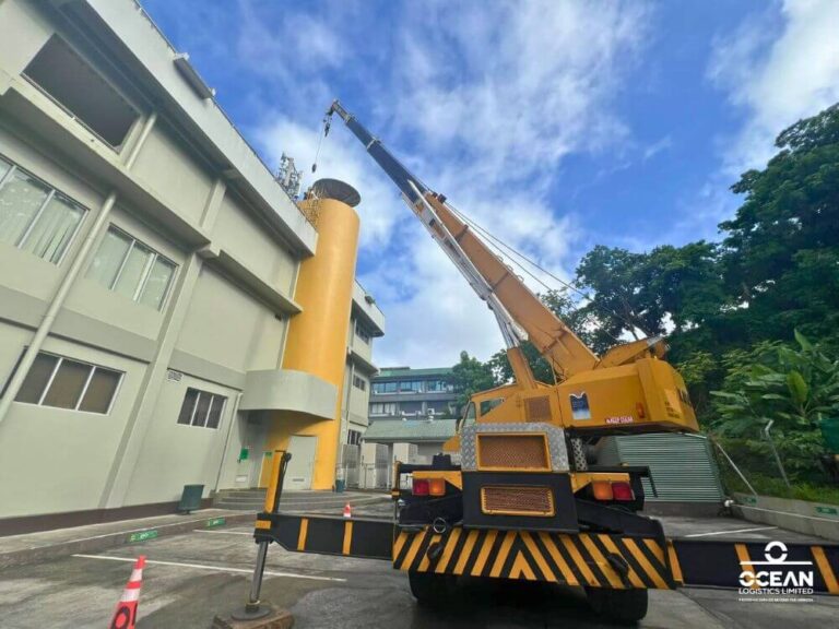 Refurbishing National Bank of Vanuatu's headquarters with our Ocean Logistics Limited's crane lift.