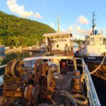 Tugboat Warringa leads the LC Sarafenua on her final voyage from Port Vila to Luganville, Santo.