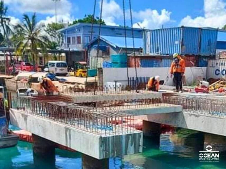 Jitendra Lal Sharma, the Site Manager and Crane Operator at Ocean Logistics Limited, along with his son Shail, supported the McConnell Dowell team in advancing the construction of the new Mala Base Wharf.