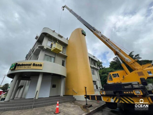 Refurbishing National Bank of Vanuatu's headquarters with our Ocean Logistics Limited's crane lift.
